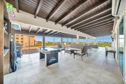 3BR Condo w/ Huge Terrace, Steps to Eagle Beach - Image 3