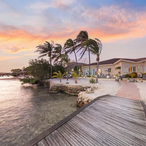 Amazing Sunsets! Beachfront 4BR with private pier - Image 1
