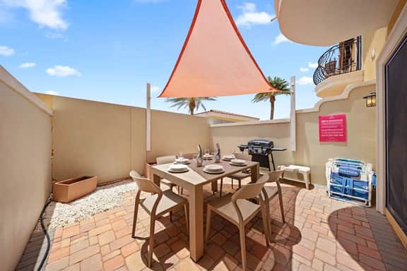 2BR Townhouse w/ Balcony & Pool near Arashi Beach - Image 2