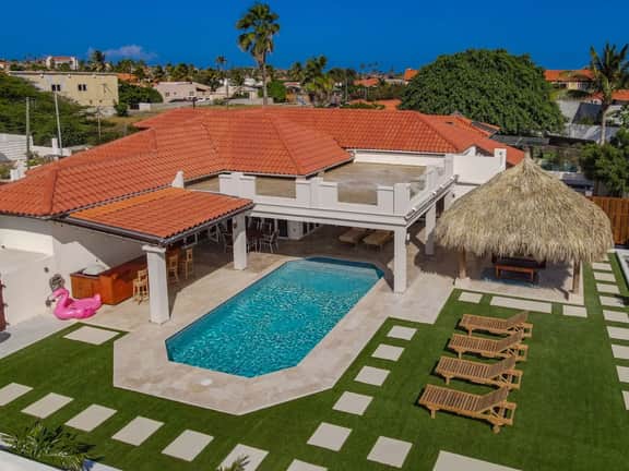 Pool Oasis: 3BR Home w/ Patio near Arashi Beach - Image 3